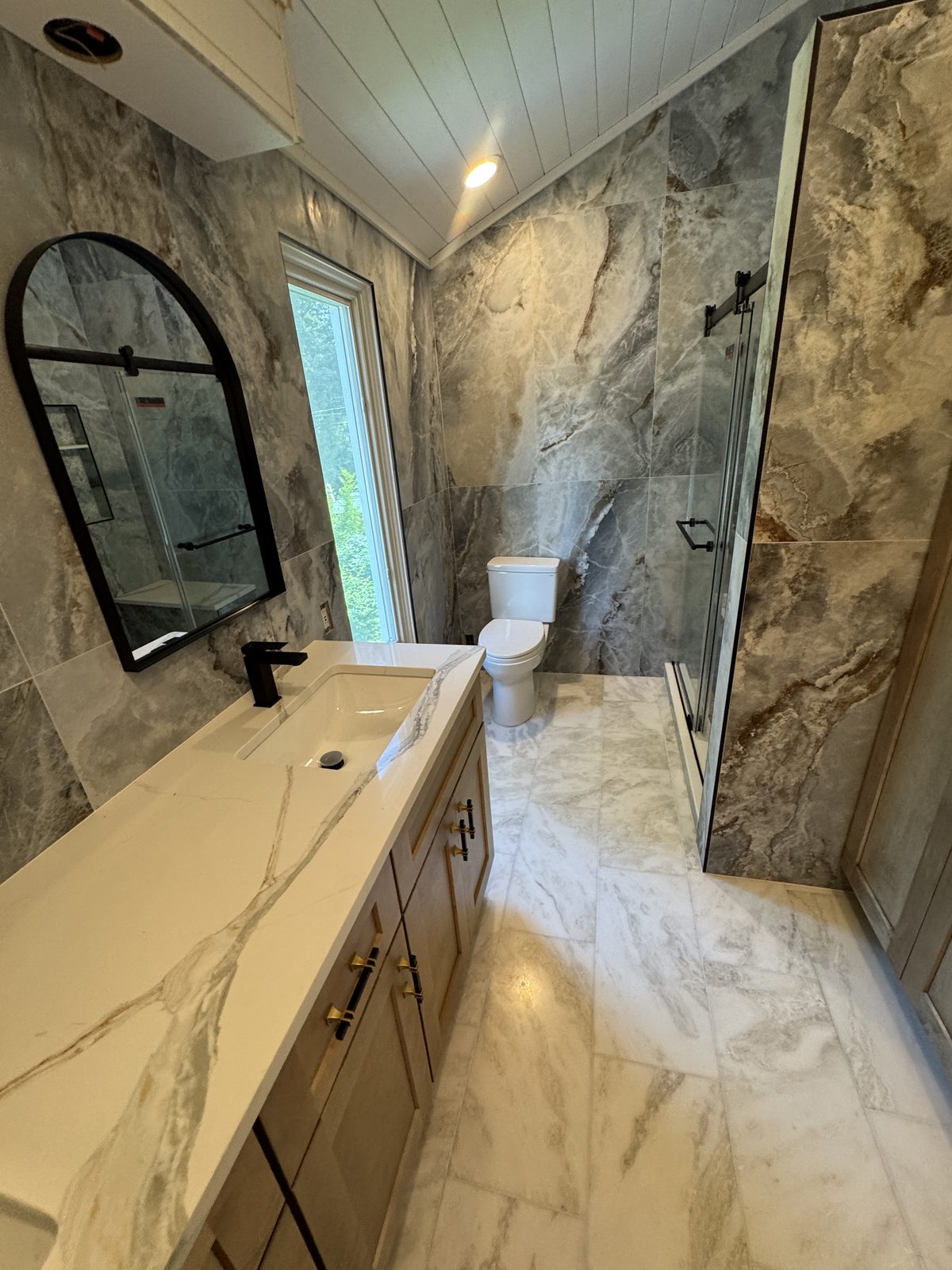Luxury marble bathroom after renovation by Altieri and Sons