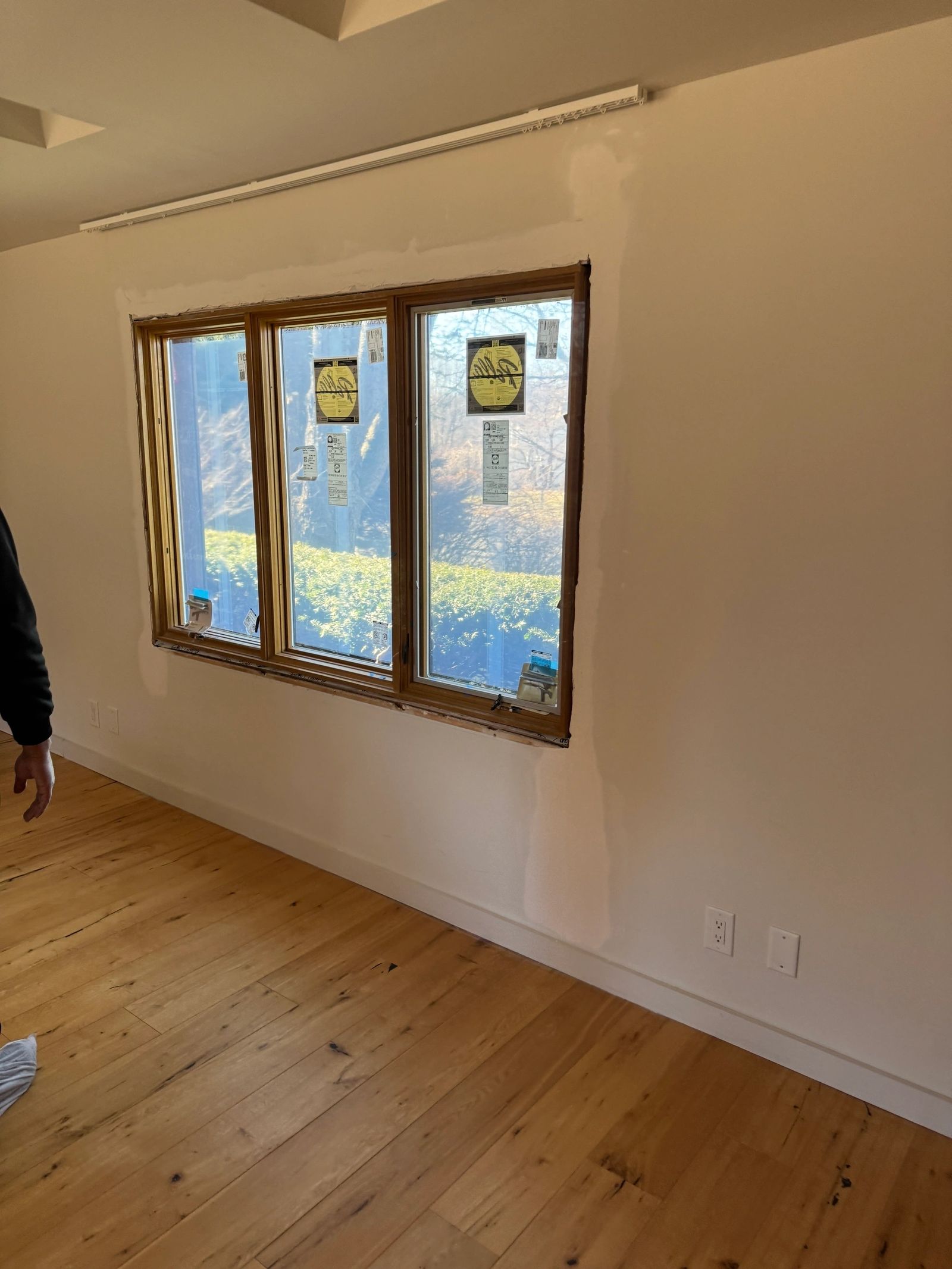 New triple casement window installation viewed from interior