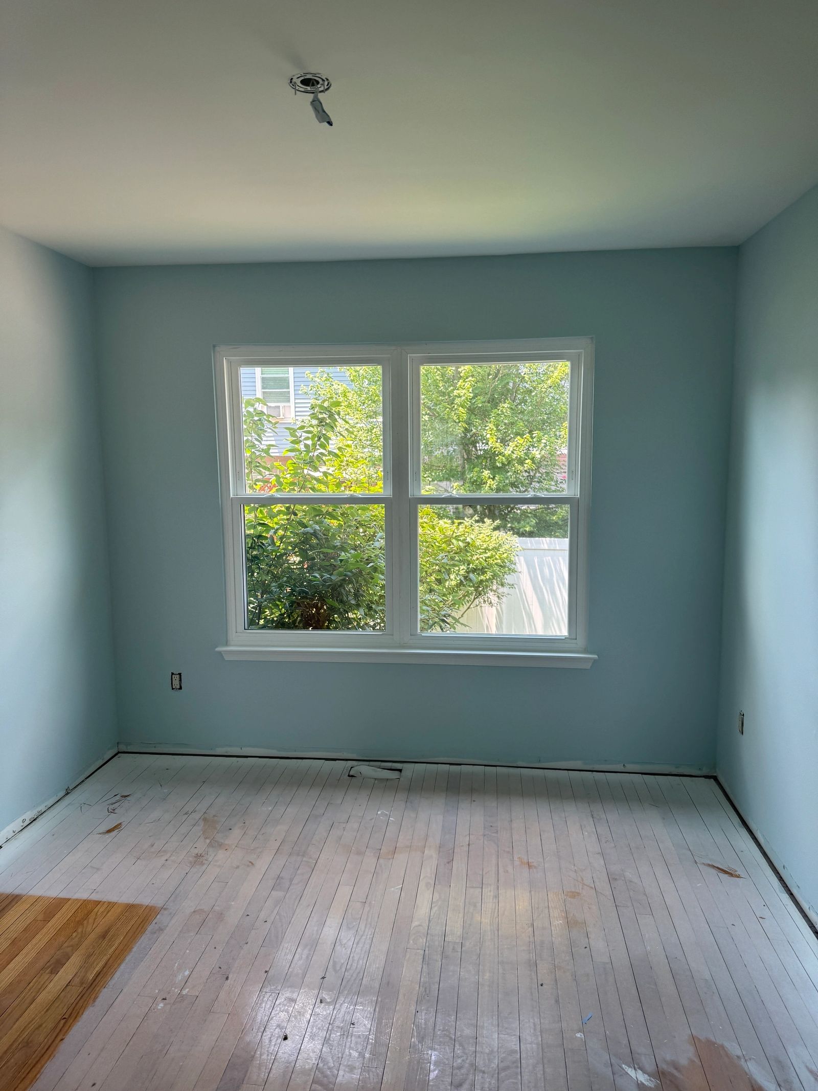 Custom window installation on home exterior by Altieri and Sons