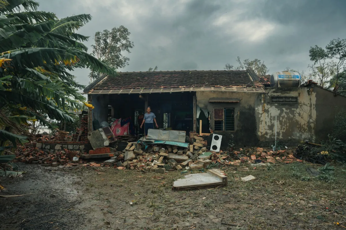 Storm-damaged roof with missing shingles requiring repair